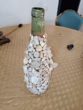 Bottiglia Vintage ricoperta di Conchiglie