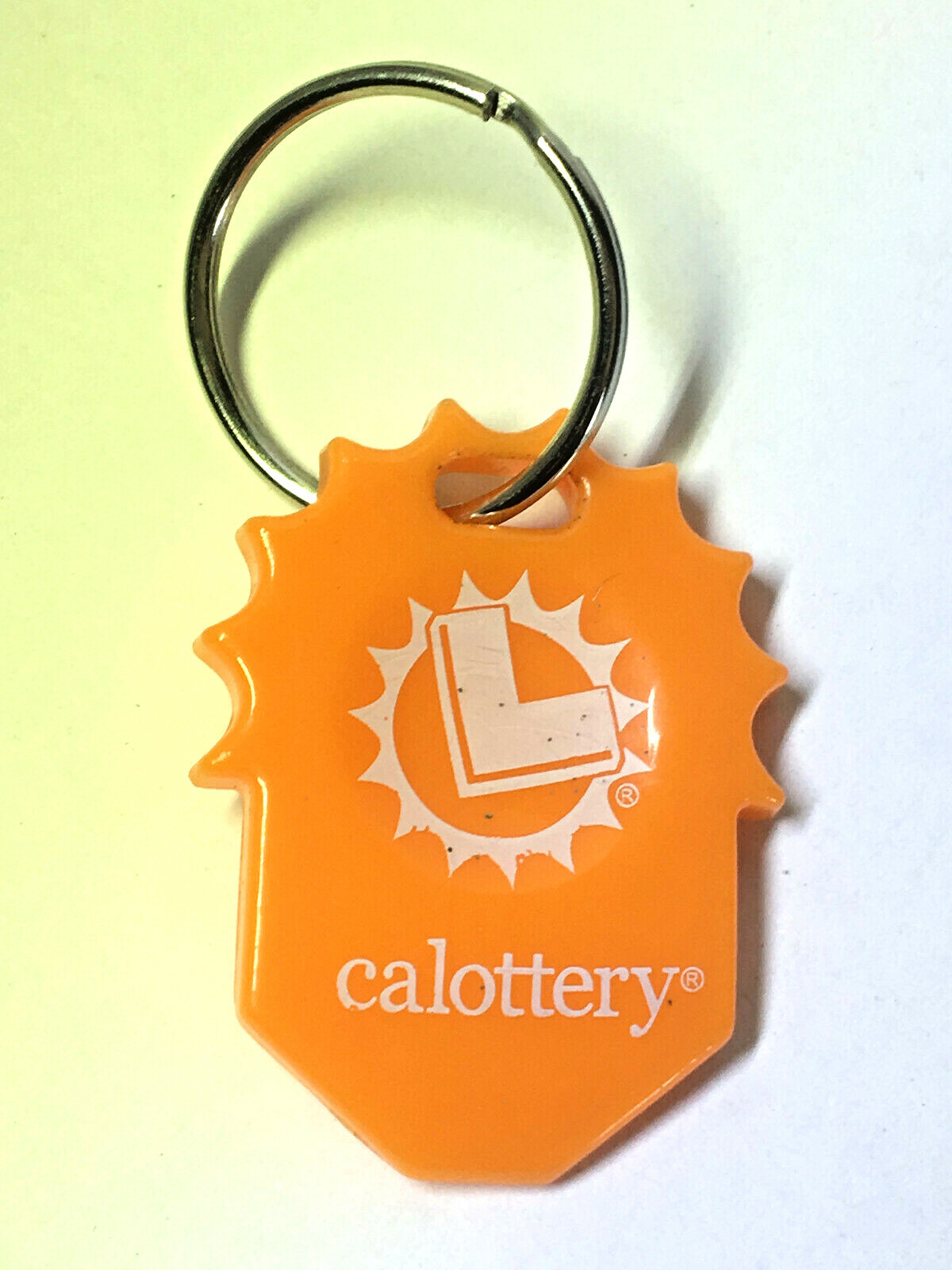CALIFORNIA LOTTERY SCRATCHERS Lotto Sun Logo KEYCHAIN Orange LUCKY