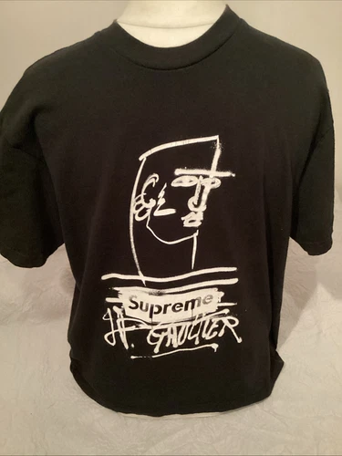 Tee shirt Supreme Jean Paul Gaultier, Royaume Uni M, graphique noir/blanc, très bon état.
