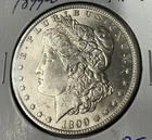 (A) 1899-O SILVER BU MORGAN DOLLAR 1$