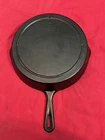 Vintage cast Iron skillet  3 notch Lodge #8 ? sits flat VGC
