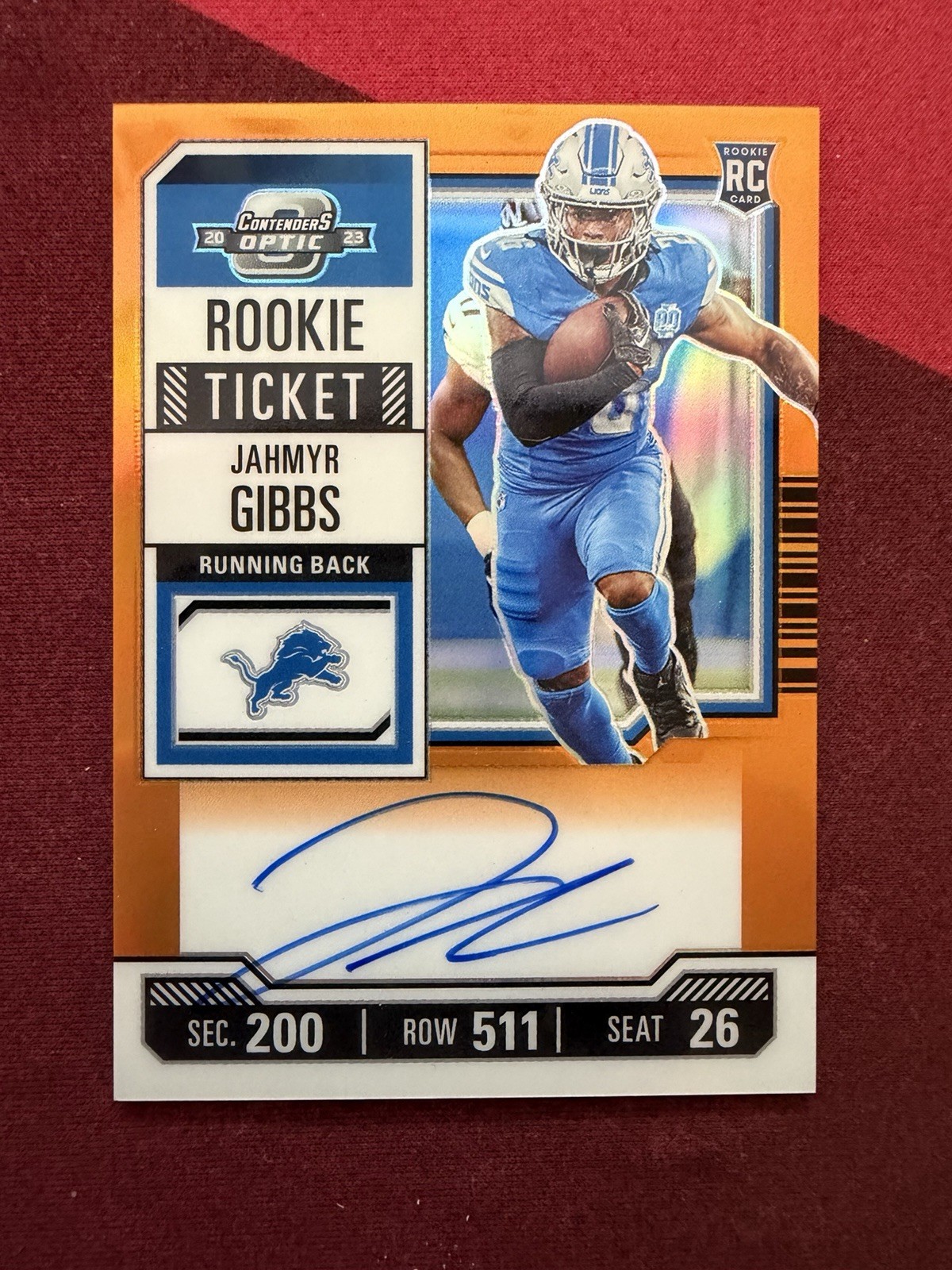 2023 Panini Contenders Optic Jahmyr Gibbs Rookie Ticket Auto Orange /50 Lions