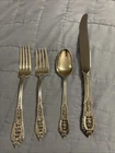 Rose Point by Wallace Sterling Silver individual 4 Piece Place Setting