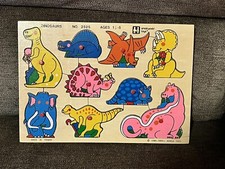 1985 Small World Toys Dinosaurs Wood Puzzle