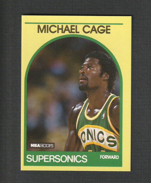 1989-90 Hoops Superstars Yellow Michael Cage #92 Seattle Supersonics