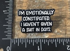 EMOTIONALLY CONSTIPATED Funny Saying Humor Lapel Hat Pin Badge Metal