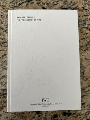 WATCHES FROM IWC, THE PROGRESSION OF TIME CATALOG AND PRICE LIST 2001 2002