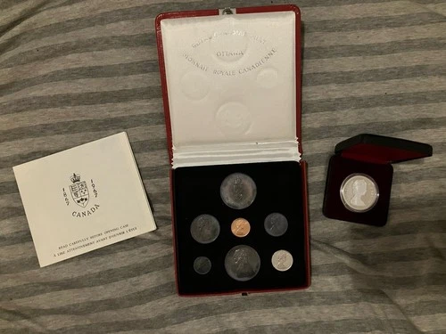 Royal Canadian Mint 1967 Centennial Coin Set & 1983 Universiade Silver Dollar