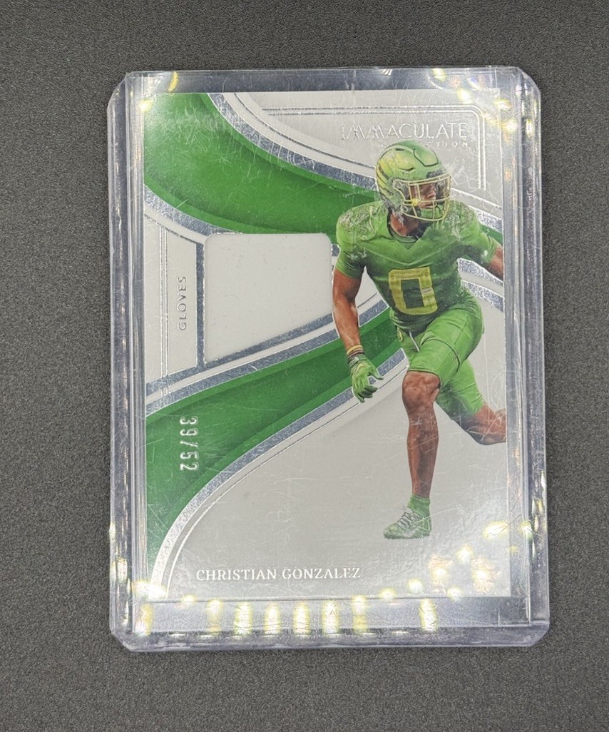 Christian Gonzalez Panini Immaculate Collection Collegiate Immaculate Gloves Memorabilia #IGCHG Base