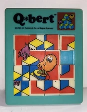 1983 Qbert Sliding Square Puzzle Handheld Plastic American Publishing BLUE RARE