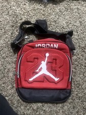 Red Jordan fanny pack with Jordan logo and stylish Brand New. Super cool Price.