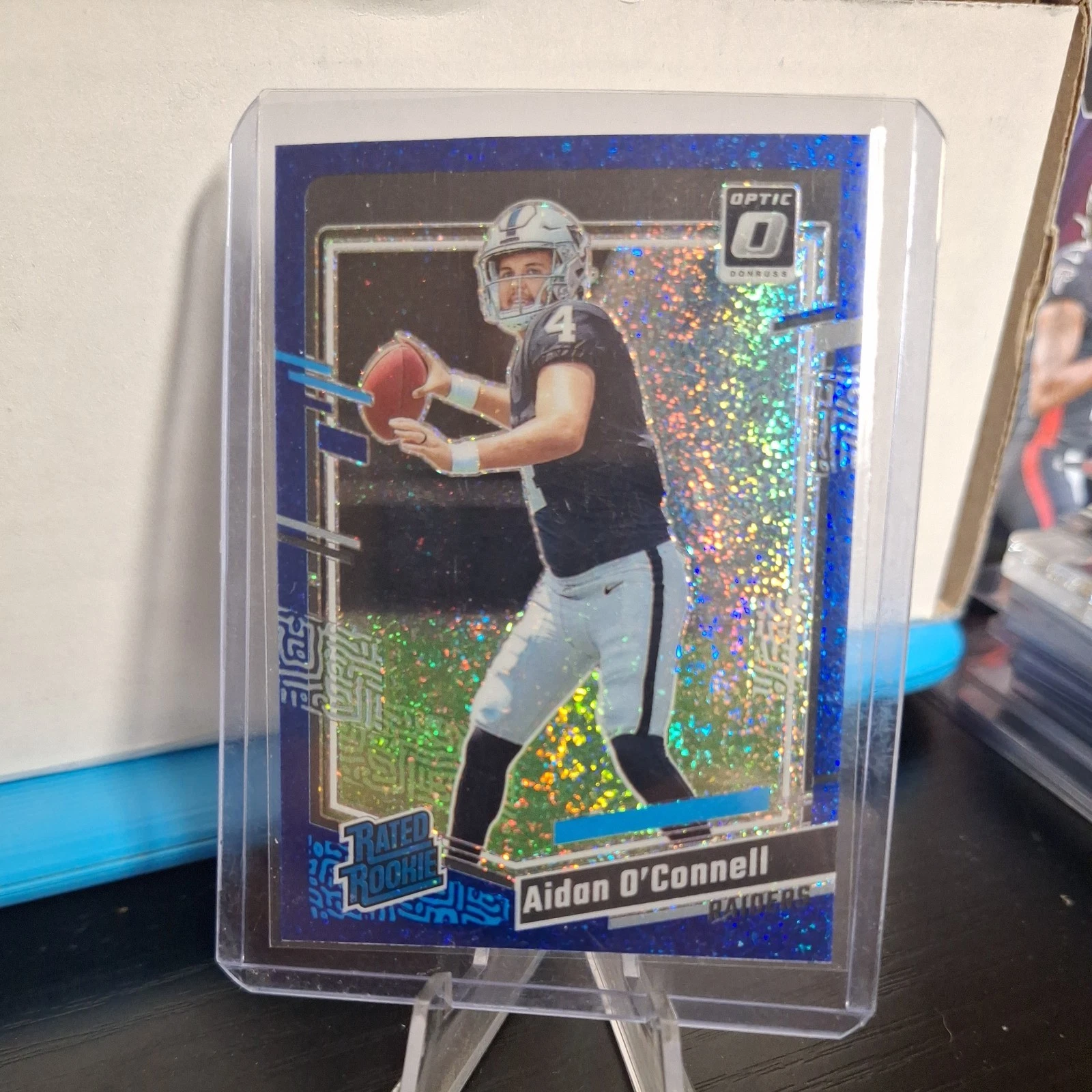 2023 Optic - Rated Rookie Aidan O'Connell #258 Blue Glitter
