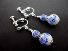 A PAIR OF PORCELAIN FLORAL BEAD  DROP DANGLY CLIP ON EARRINGS. NEW.