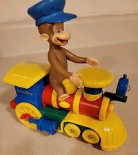 Vintage Curious George Bump & Go Train Toy (N...