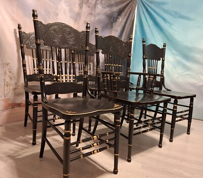 Set of black dining chairs with hand painted gold details UK