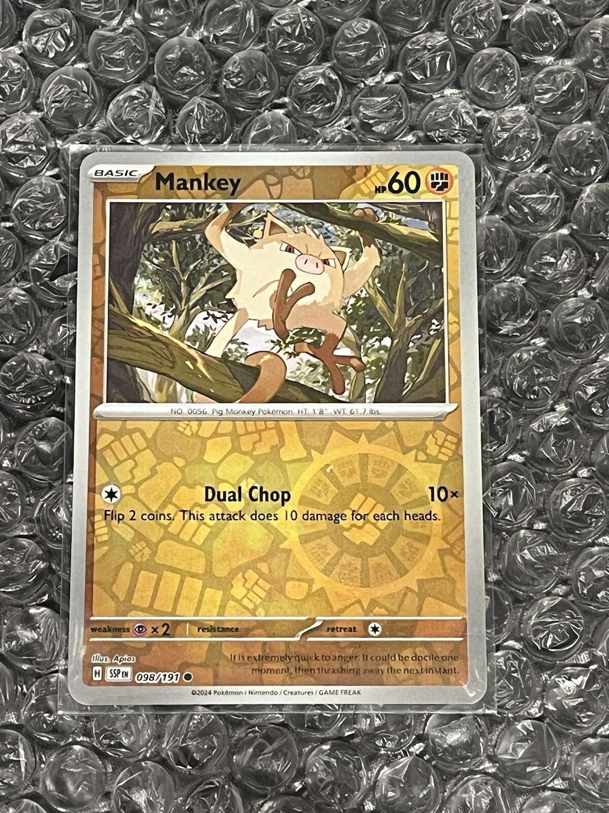 Mankey 098/191 Sv08: Surging Sparks Reverse Holo NM Pokemon TCG Card