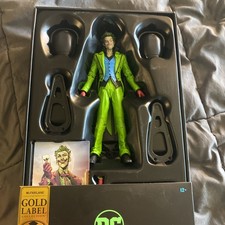 McFarlane Toys The Joker Infinite Frontier Black Light Edition Gold Label New