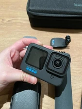 GoPro HERO11 Black Camera with Accessories - extra battery charging case