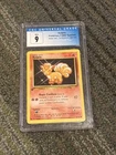 CGC 9 (1999 Pokemon Base Set 1st Edition Vulpix) (Spanish)