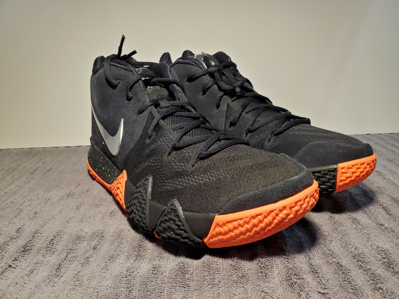 kyrie 4 black and orange