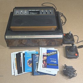Atari 2600 System Bundle with Console, 37 Games, Joystick, Manuals, and More LOT