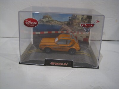 Disney Store Cars 2 Gremlin Die Cast Car In Collector's Case