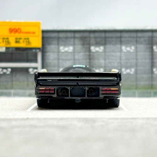 Spark 1:64 Porsche 962 auto display edizione limitata rivestimento mimetico modello in lega - Foto 8 di 8