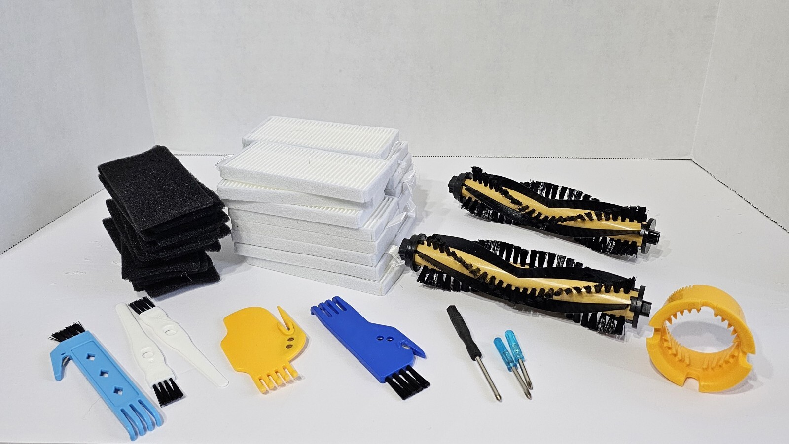 Roomba replacement parts including filters brush combs and trimming tools-image