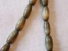 26 DARK BROWN FIBER OPTIC CATS EYE 15MMX5-6MM BEADS cat15