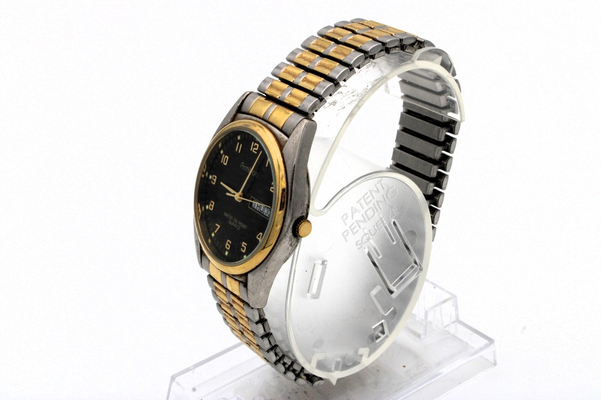 Armitron Watch Gold Tone Day Date Stretch Band New Battery 20