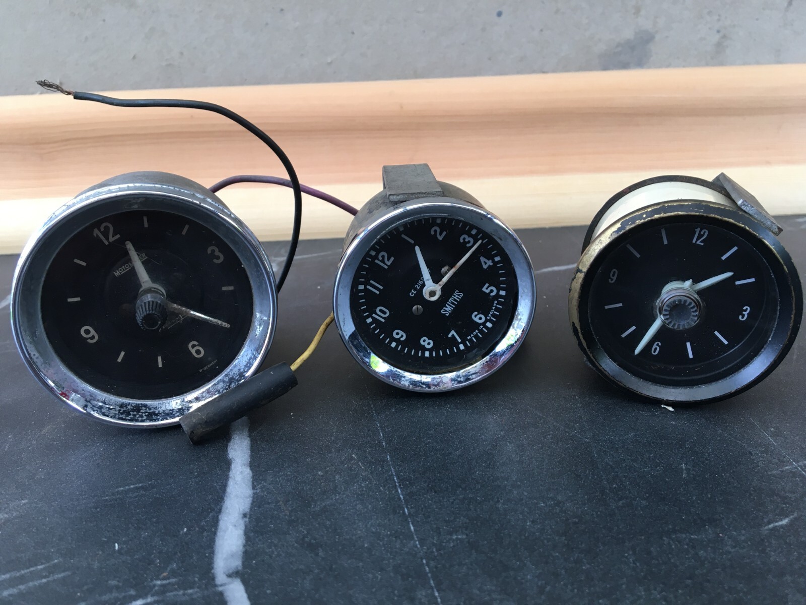 3 vintage classic British 12v car clocks Spares or repair only