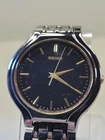Vintage Men's Seiko V701-1K20 Black Tone Quartz Watch -  New Battery