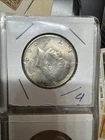 1964 uncirculated kennedy half dollar