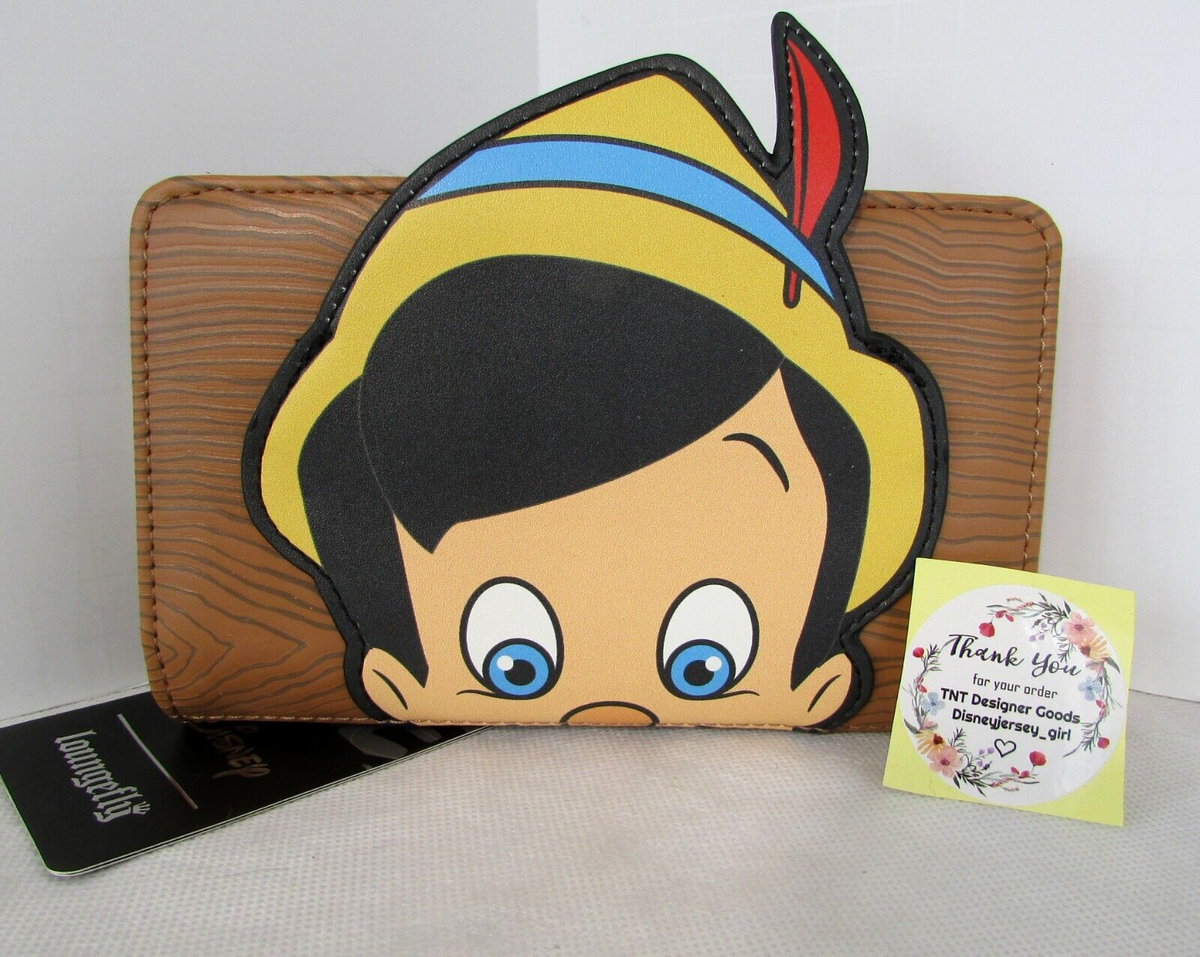 Loungefly Disney Pinocchio Figural Wristlet 
New & RARE!!!! Loungefly Disney Pinocchio Underwater Small | Mercari main image 3