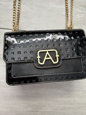 Arcadia black patent shoulder bag with gold chain strap and logo accents