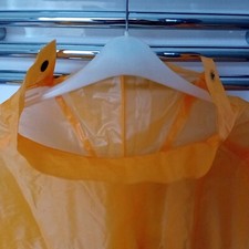 Męskie/damskie żółte ponczo pokrowiec przeciwdeszczowy.. Nowy nieużywany