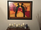 A soulful sax player stands beneath a haze of golden light, lost in the music. — photo 1