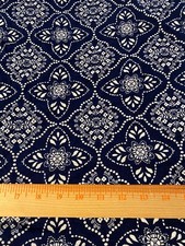 Polyester blend knit fabric navy with white design 48" x 64" very stretchy