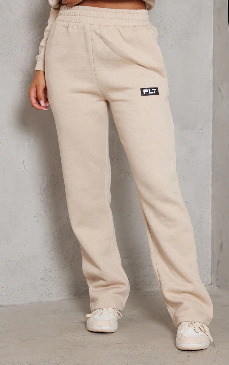 PRETTYLITTLETHING Joggers Logo Badge Detail Straight Leg in Sand