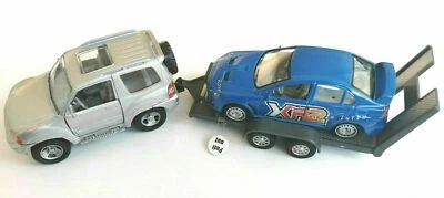 KIDSGLOBE Mitsubishi Jeep Metall mit Anhänger super Rallyauto 28cm Transporter Licht Sound