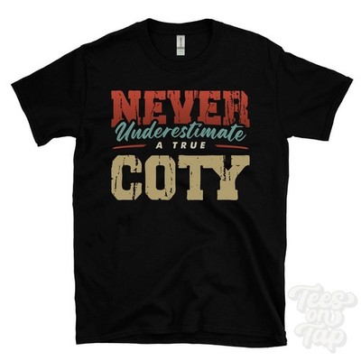 NEVER UNDERSCHIMATE A TRUE COTY T-SHIRT - Wear Your Name Proudly
