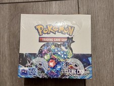 stellar crown booster box tcgplayer Pokemon TCG SV07 – Booster Pack Cards as well as 65 card sleeves adorned with the Stellar Form Terapagos design Pokemon TCG Stellar Crown Booster