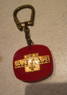 BOURBON KEYCHAIN: ANTAR FLEUR DE LYS double-sided same