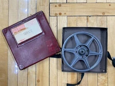 Film case with empty film reel