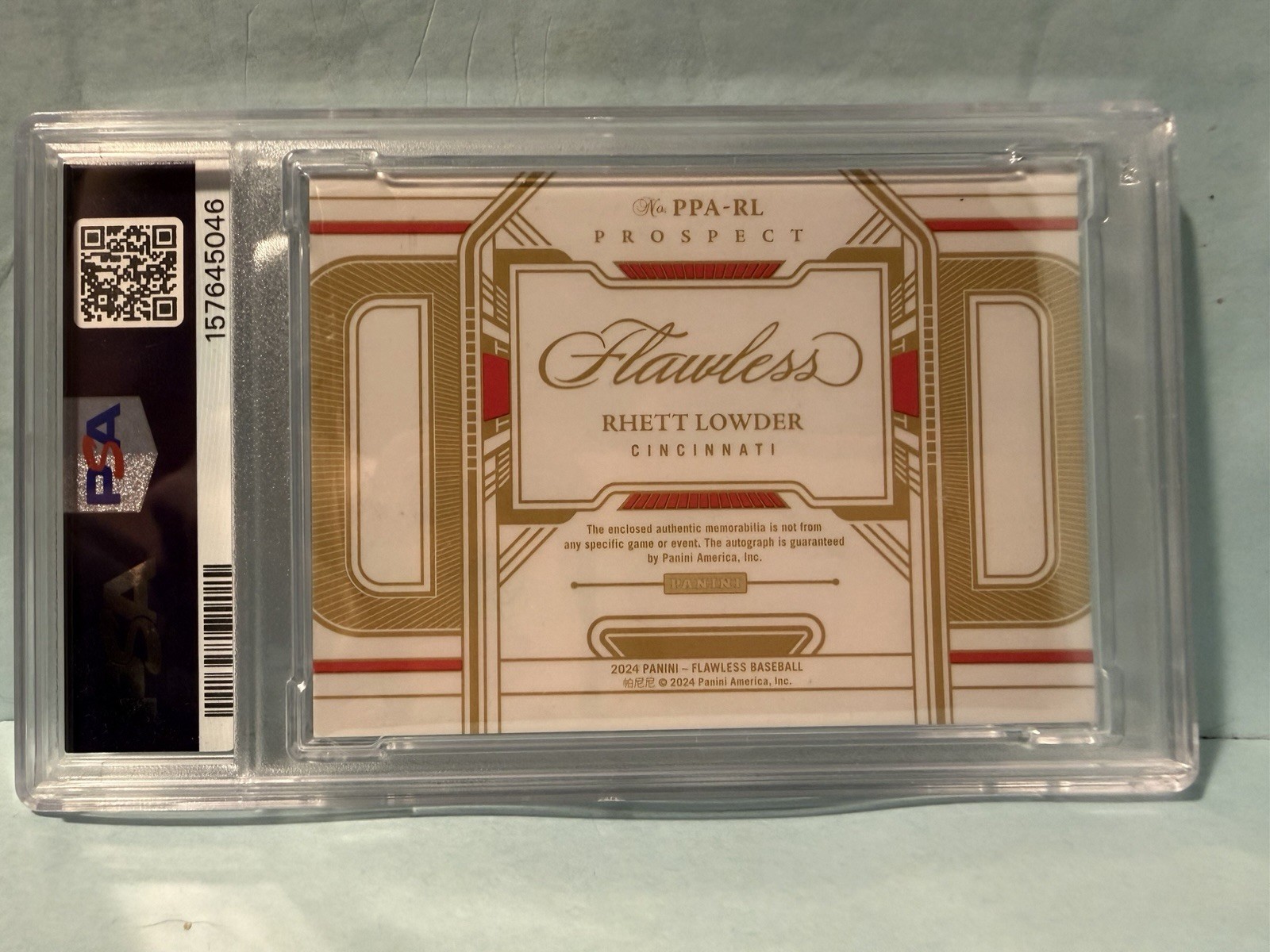 2024 Panini Flawless Rhett Lowder Prospect Patch Auto Sapphire /15 PSA 8 view 2