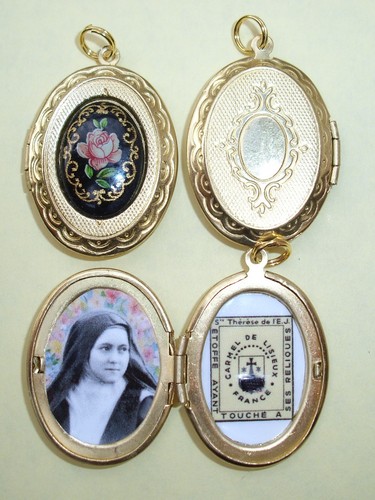 St Therese relic locket with beautiful red rose front!