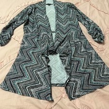 Multicolored asymmetrical duster cardigan/jacket with an abstract/tribal vibe.