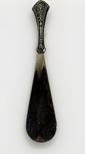 ANTIQUE AMERICAN STERLING HANDLED SHOEHORN w/ REPOUSSE ENGRAVED DESIGN- 33.2g