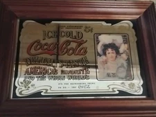 Vintage Coca-Cola advertising mirror.