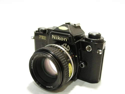 Nikon FE2 35mm Film Camera with Nikkor 50mm f1.8 Lens, Hood & L37 UV Filter